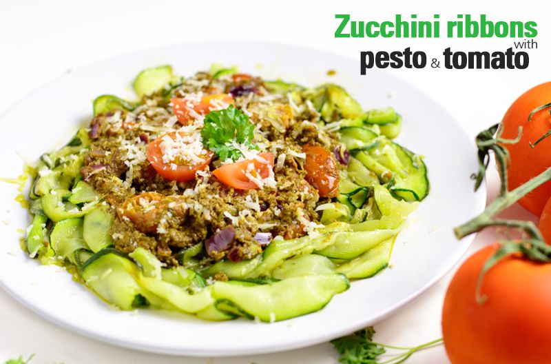 Zucchini ribbons with pesto and tomato