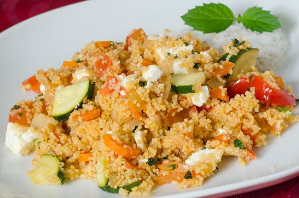 Zucchini and mushroom couscous with feta cheese