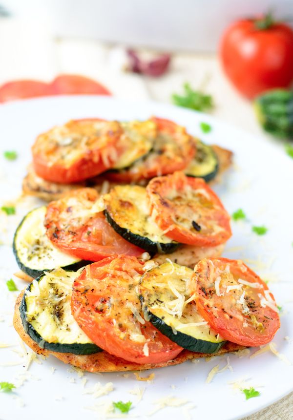 Baked chicken breast with zucchini and tomato